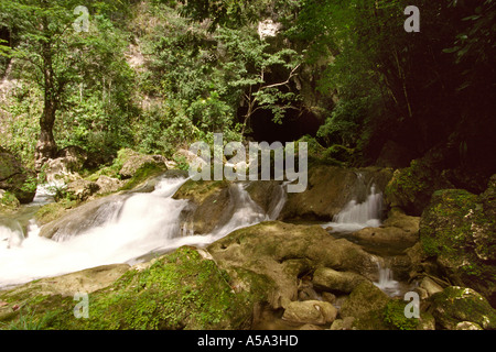 Belize Blue Creek river emerging from the hill Stock Photo