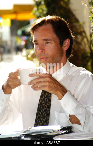 3120 Model released  man in street cafe Stock Photo