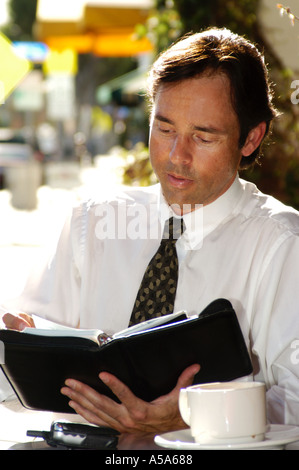 3120 Model released  man in street cafe Stock Photo