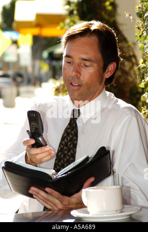 3120 Model released  man in street cafe Stock Photo