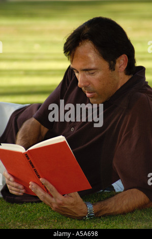 3120 Model released  Man reading book Stock Photo