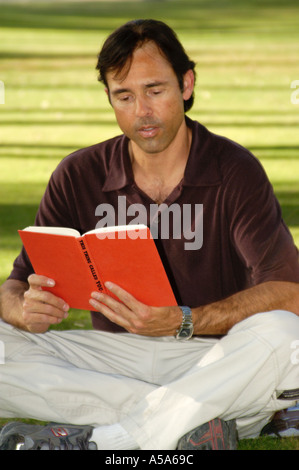 3120 Model released  Man reading book Stock Photo