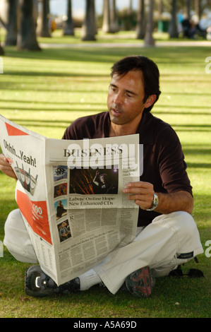 3120 Model released  Man reading newspaper Stock Photo