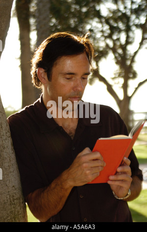 3120 Model released  Man reading book Stock Photo