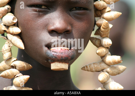 Mursi tribe girl with lip plate, Lower Omo Valle, Ethiopia Stock Photo