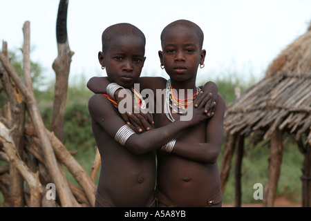 Hamer tribe children embrace, Turmi, Lower Omo Valle, Ethiopia Stock Photo