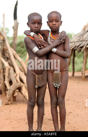 Hamer tribe children embrace, Turmi, Lower Omo Valle, Ethiopia Stock Photo