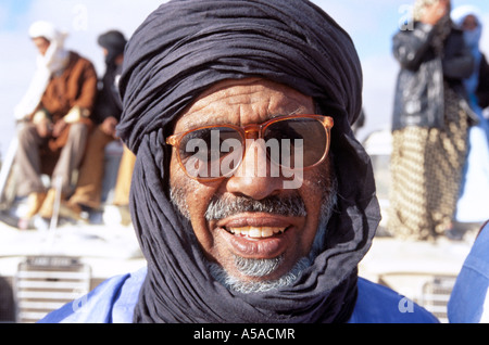Berber man wearing sunglasses, Tindouf, Western Algeria Stock Photo