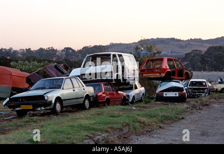 Damaged cars piled up on the side of a road in Soweto South Africa Stock Photo