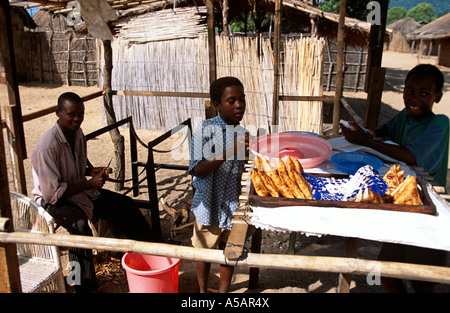 Boys at a stall selling food in Malawi Africa Stock Photo