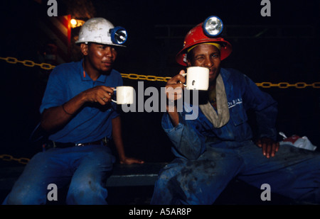 Miners taking break from work in diamond mine, South Africa Stock Photo