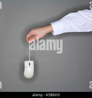 hand holding computer mouse Stock Photo