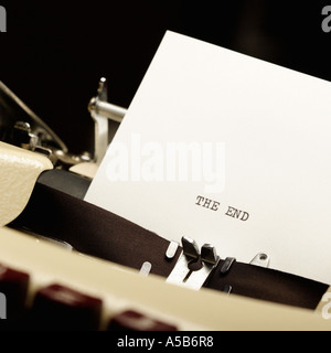 Detail of typewriter and piece of paper with writing The End Stock Photo