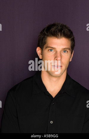 Young man posing in photo booth. Stock Photo