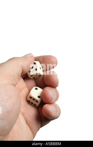 Rolling the Dice cut out on white background Stock Photo