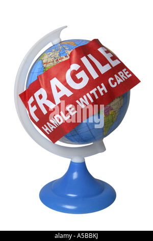 Fragile Sticker on Globe cut out on white background Stock Photo