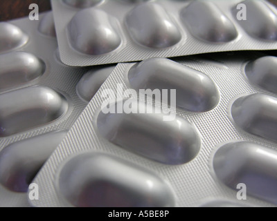 capsules containing Omeprazole as gastro resistant granules Stock Photo