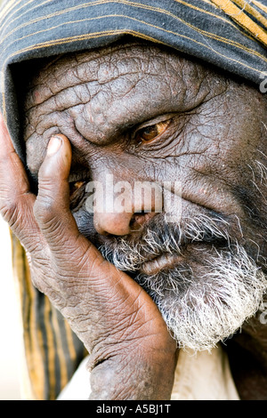Old Indian man looking distant and introspective. Andhra Pradesh, India Stock Photo