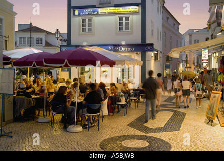 Portugal, the Algarve, Lagos, street scene in the evening with outdoor restaurants Stock Photo