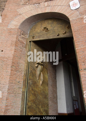 Curch of santa maria degli angeli and basilica in roman baths of the diocletian thermae, door entrance, bronze sculpture, rome, Stock Photo