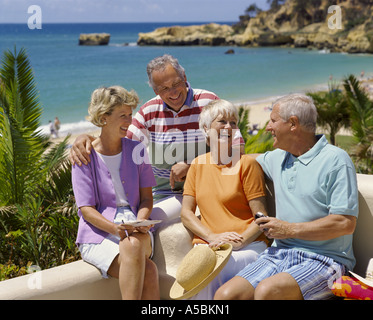 two couples of retirement age on holiday in the Algarve, Portugal Stock Photo