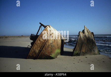 Wreck of the Hentrietta Splachett one of Namibia's shipwrecks broken to half on the desolate northern Skeleton Coast Namibia Stock Photo