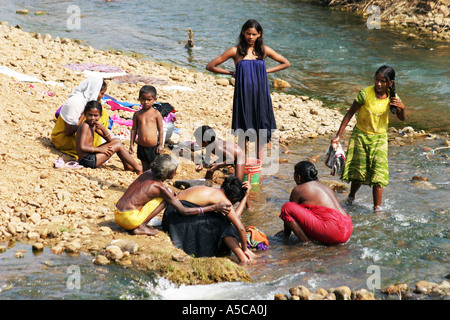 Wash day in the Karaut district  of Orissa Southern India Stock Photo