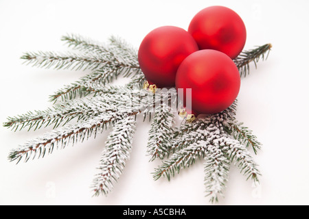 Christmas bauble with pine leaves, close-up Stock Photo