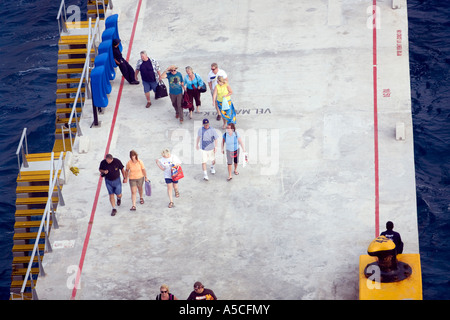 Cozumel tourists returning to the ship. Stock Photo