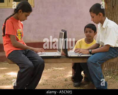 School students using computers at the school run through Horizon Lanka Foundation Stock Photo