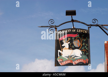 Swinging Pub sign for the White Hart public house in Arundel, West Sussex. Stock Photo