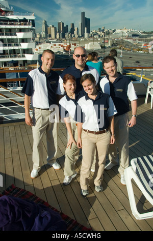 Holland America ms Veendam and Celebrity Cruise Lines Summit cruise ships in the port of Seattle with cruise activities staff Stock Photo