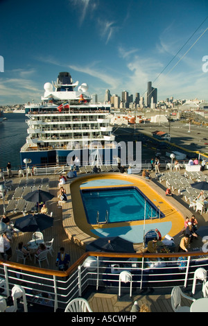 Scenic views of Holland America ms Veendam and Celebrity Cruise Lines Summit cruise ships in the port of Seattle Stock Photo