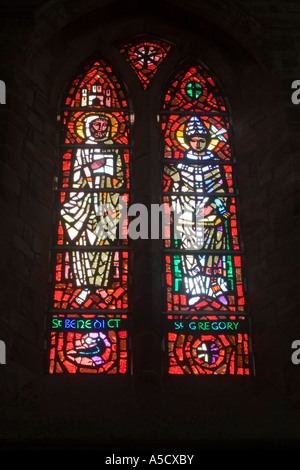 Stainglass window at Pluscarden Abbey, Elgin, Morayshire, Scotland. Showing St Benedict and St Gregory. Stock Photo