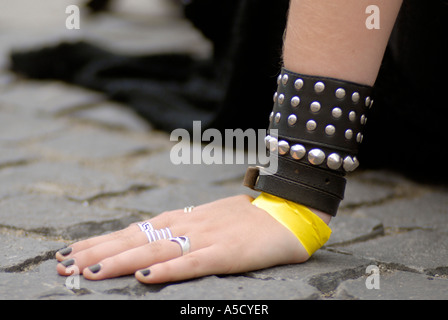 Female hand with heavy metal jewelry during Concert in Piata Mare, Sibiu, Romania Stock Photo