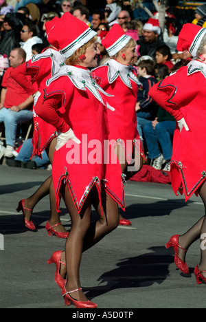 Band of majorettes marching during a Christmas parade Stock Photo