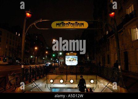 Paris Metro entry at night Stock Photo - Alamy