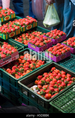 Stock photo of strawberries being sold at the Snake Alley Night Market in Taipei Taiwan Stock Photo