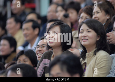 Spectators at Sha Tin Racecourse located in Sha Tin in the New Territories.  in Hong Kong China Stock Photo