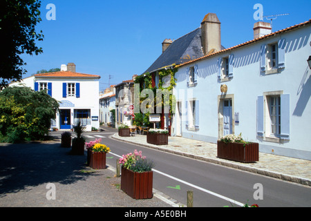 Pretty pastel painted houses in Noirmoutier-en-l'Ile, Island off Atlantic coast of Western France Stock Photo