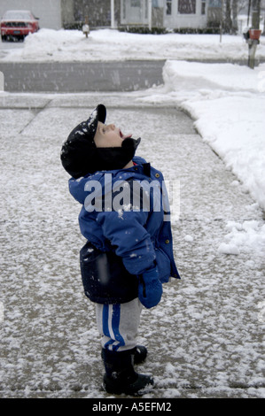 3 yr old snow shower 2 Stock Photo