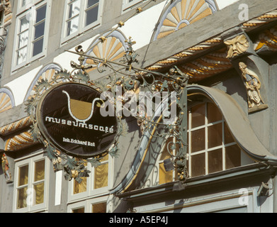 Wrought iron sign outside Museumscafé, Stiftsherrenhaus, Osterstrasse, Hameln (Hamelin), Neidersachsen (Lower Saxony), Germany. Stock Photo