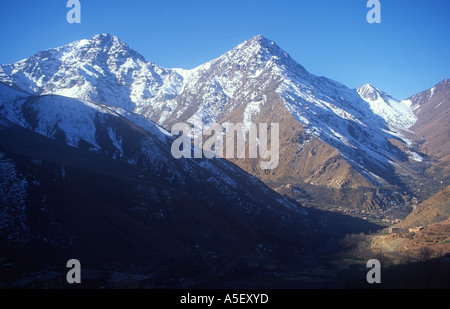 Atlas mountains in winter snow  Jebel Toubkal trek route near Imlil Morocco north Africa Stock Photo