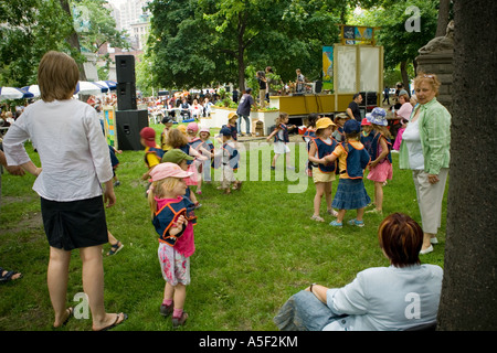 Pre school children playing in Dorcester Square, Montreal, Canada, Stock Photo