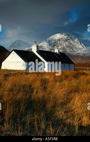Black Rock Cottage, with Buachaille Etive Mor background, Lochaber, Scotland UK Europe Stock Photo