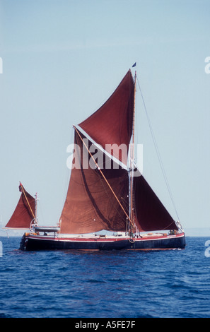 The 1900 spritsail barge Ironsides now used for charter sailing off Weymouth in Dorset England UK Stock Photo