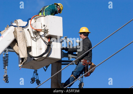 Electric power lineman installing new lines in Boise Idaho Stock Photo ...
