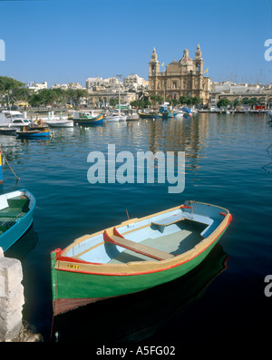 St Joseph Church from across Msida Creek in 1995 before the Yacht Marina was built, Msida, Malta Stock Photo