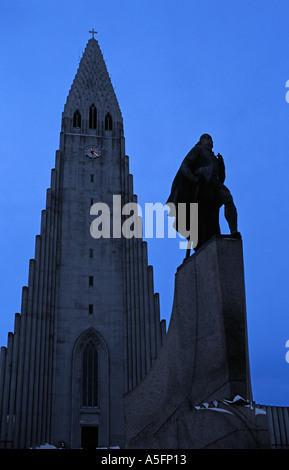 Statue of explorer Leif Eriksson looking west to the ocean Outside Hallgrimurs Church Reykjavik Iceland Hallgrimskirkja Stock Photo