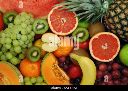 Set of different fresh fruits. Colorful background. Stock Photo